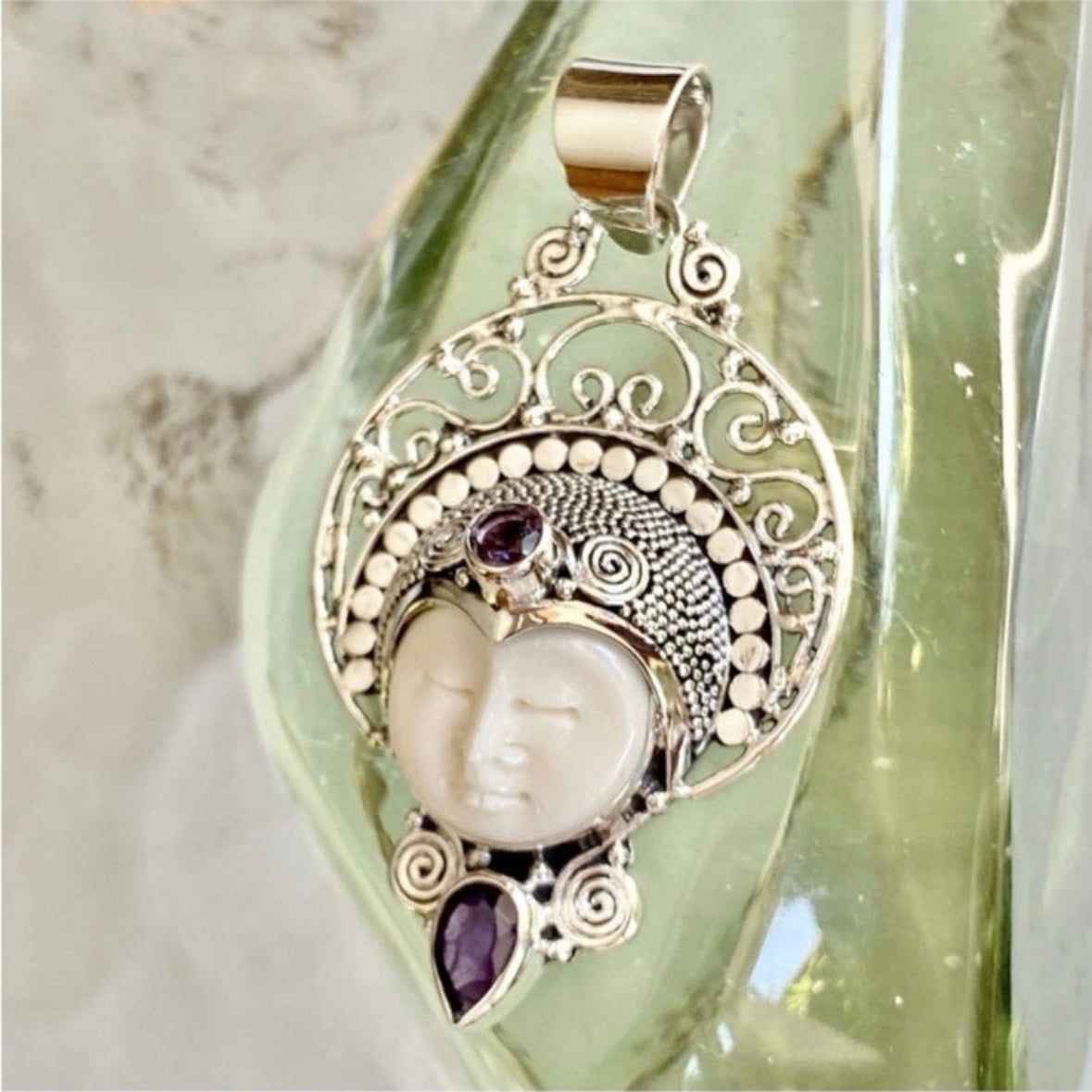 Stunning unique exotic hand-crafted artisanal solid 925 sterling silver Balinese carved bone face necklace pendant with faceted/cut Amethyst gemstones