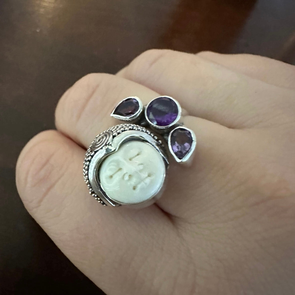 Unique exotic hand-crafted artisanal solid 925 sterling silver Balinese carved bone face ring with faceted/cut Amethyst gemstones