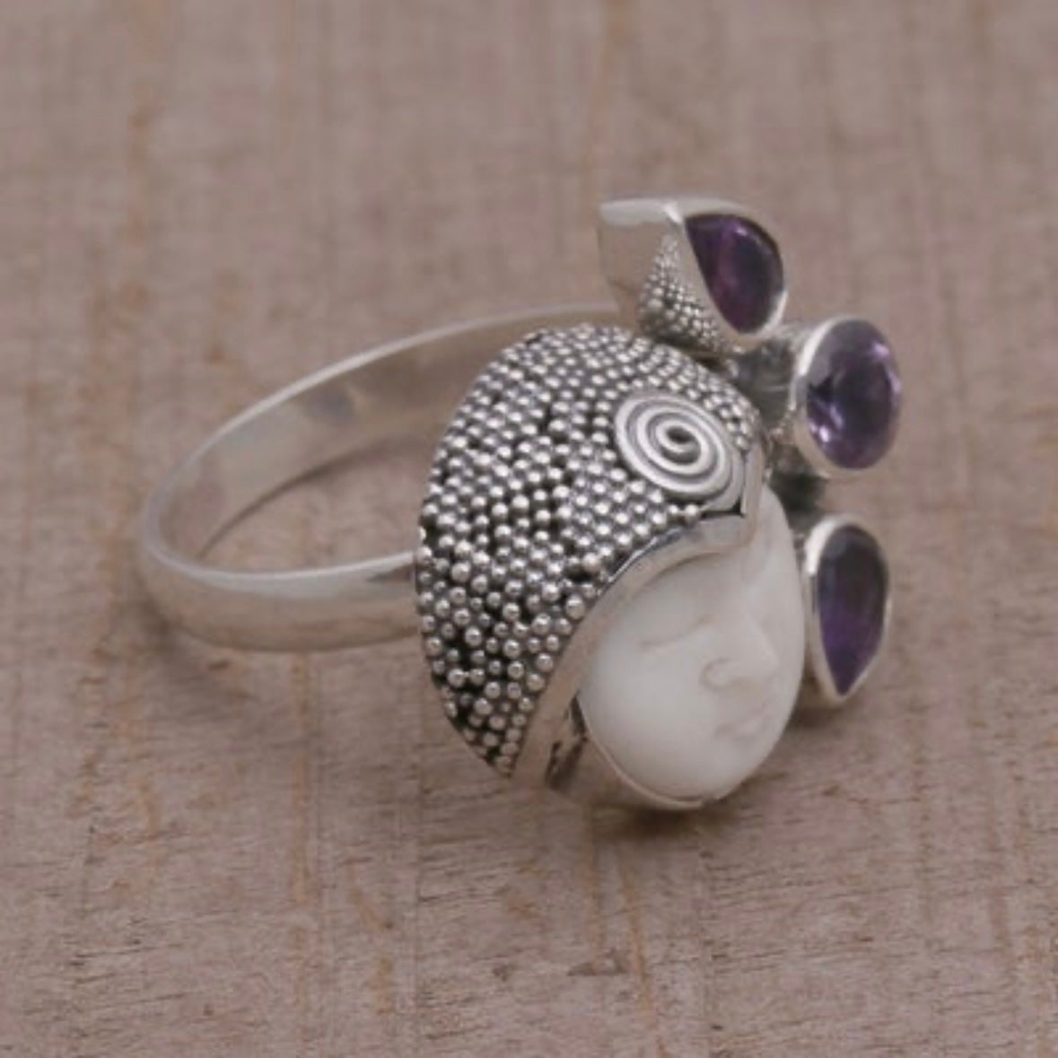 Unique exotic hand-crafted artisanal solid 925 sterling silver Balinese carved bone face ring with faceted/cut Amethyst gemstones